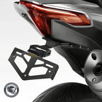 Tail tidy license plate bracket installed under the tail light of a VOGE DS model