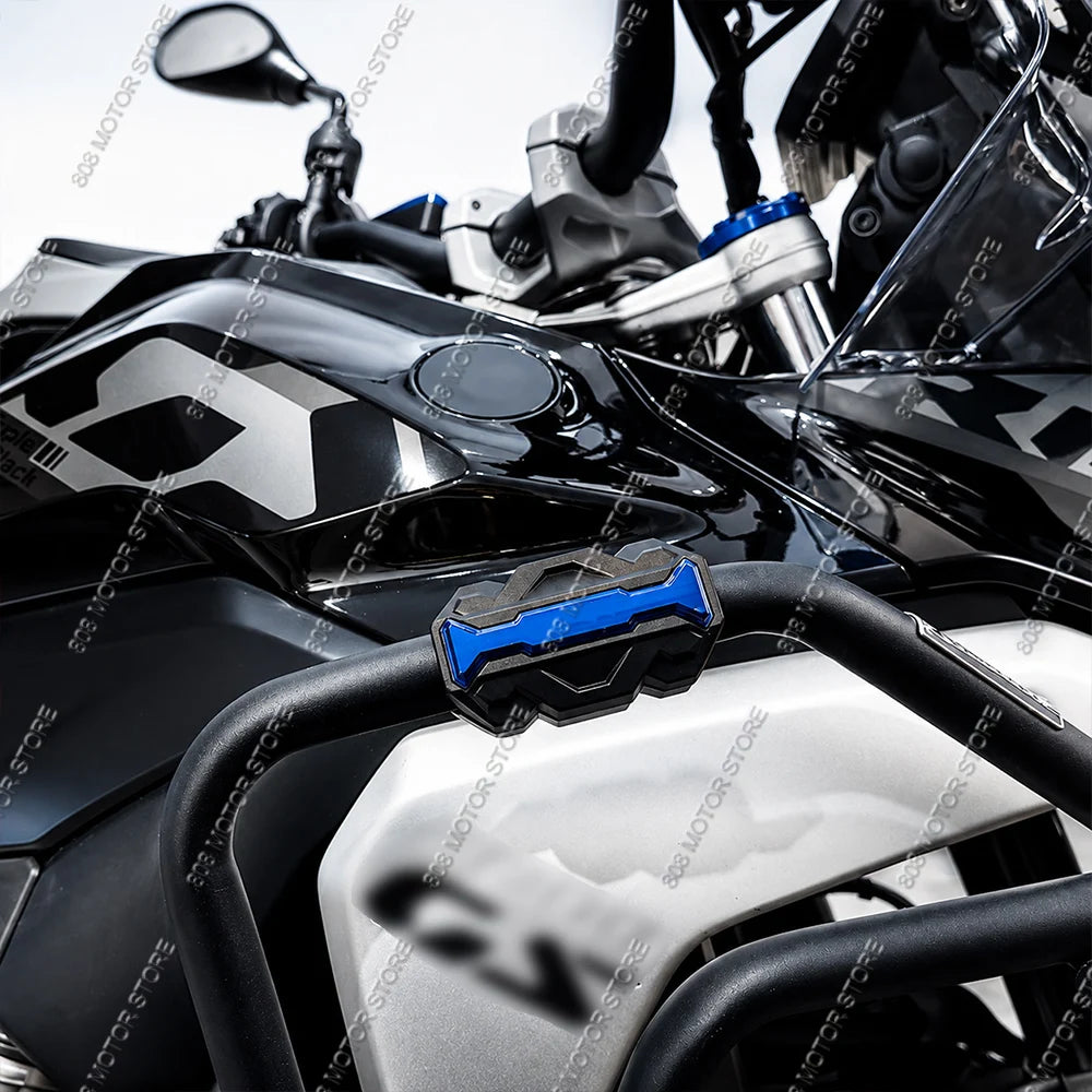 Blue crash bar protector block on engine guard bar