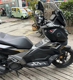 Side view of VOGE SR1 ADV with footboard mats