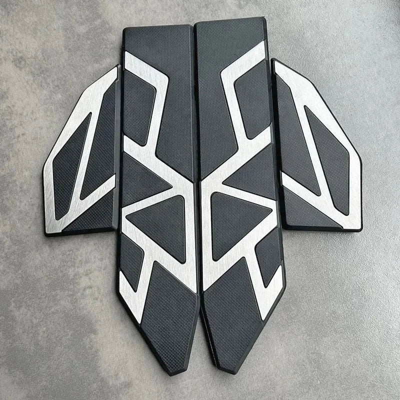 Pair of black and silver footrest decorative mats