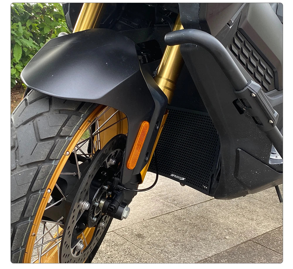 Radiator guard behind SR450X front wheel