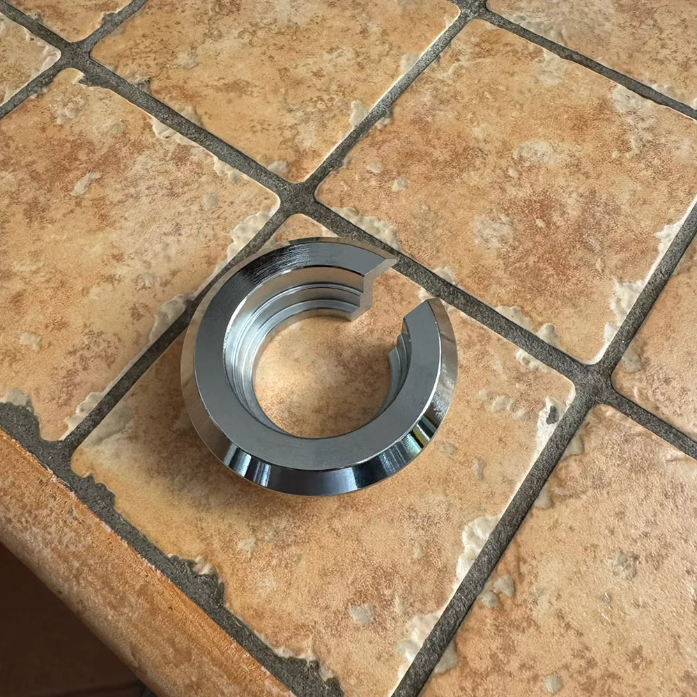 Shock lowering spacer ring, split side view