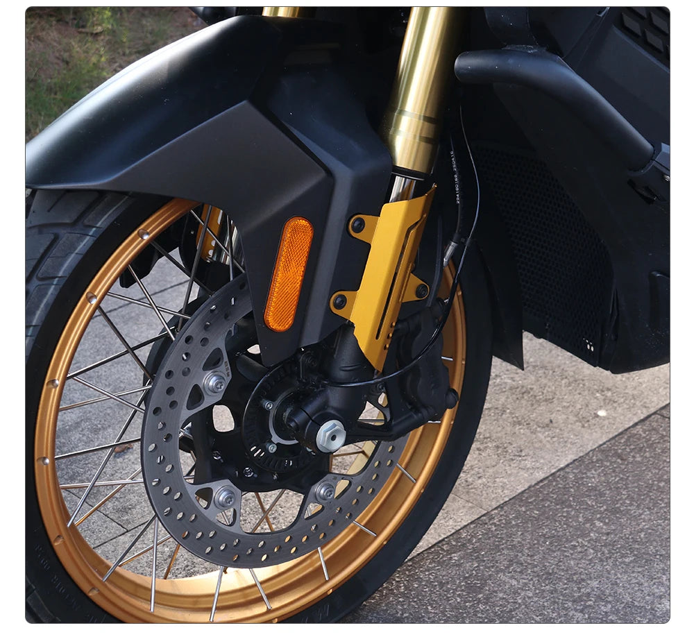 Gold fork guard on SR450X front fork, close-up