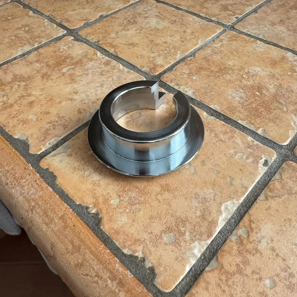 Rear shock lowering ring on tiled floor